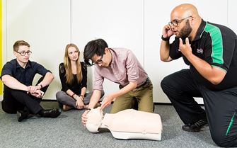 First aiders learning CPR